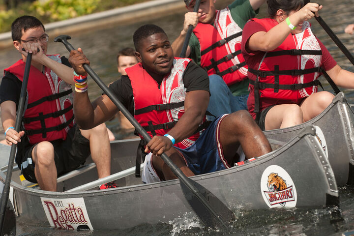 Students in canoes racing in the annual IU Indianapolis Regatta.